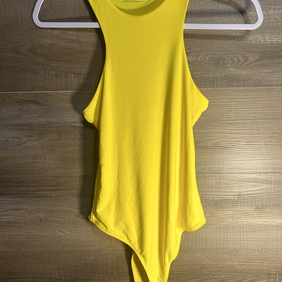 Vibrant Yellow Sleeveless Asymmetrical Cut Out Bodysuit - Picture 1 of 2